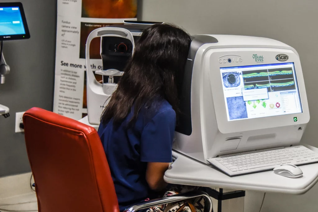 patient getting eye exam with the iscan